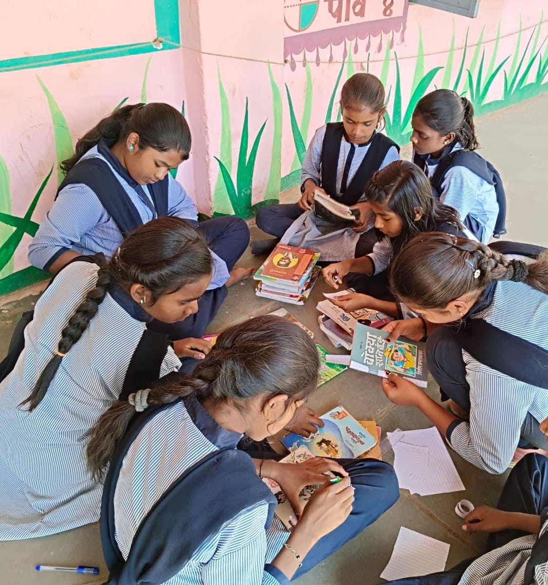 Participants of the pilot batch of LEC conducting book reading activities with their students